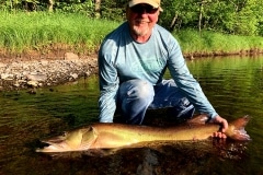 Craig Thomton, Wheaton, IL, 49-incher, while on a river float in Wisconsin.